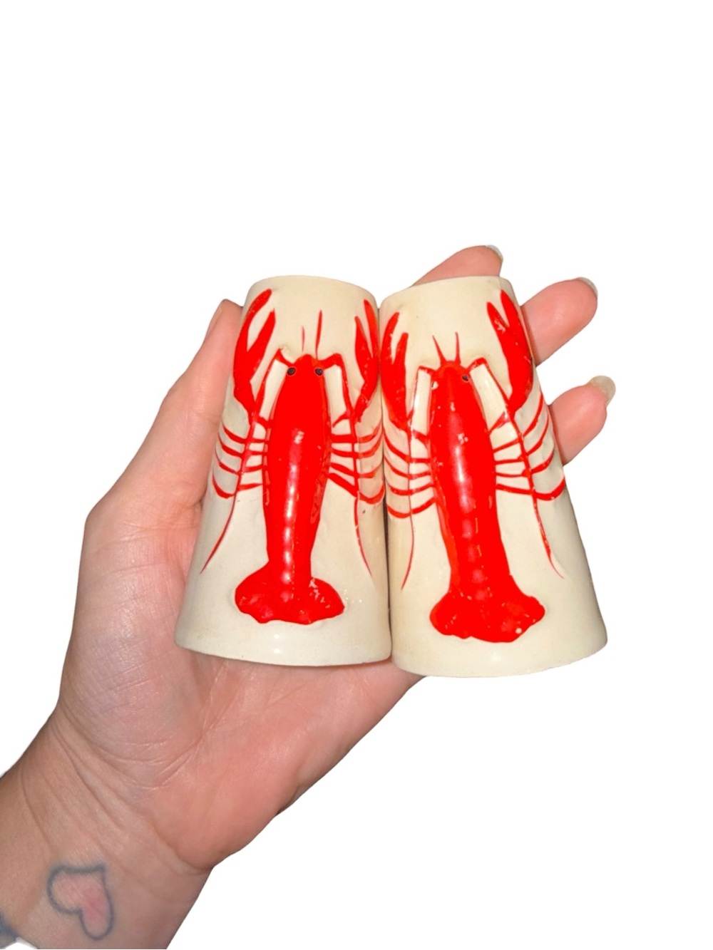Vintage shakers with red lobsters